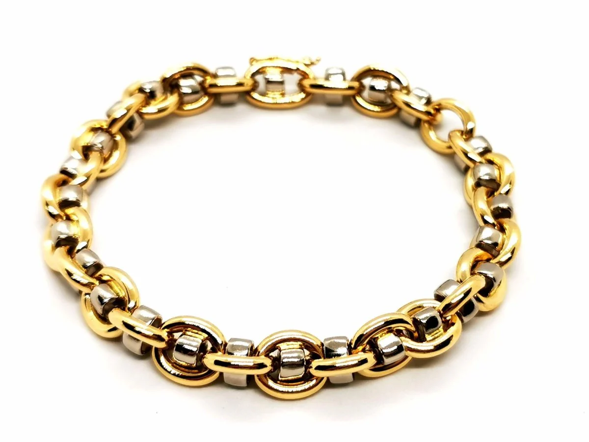 Curb bracelet in yellow and white gold
